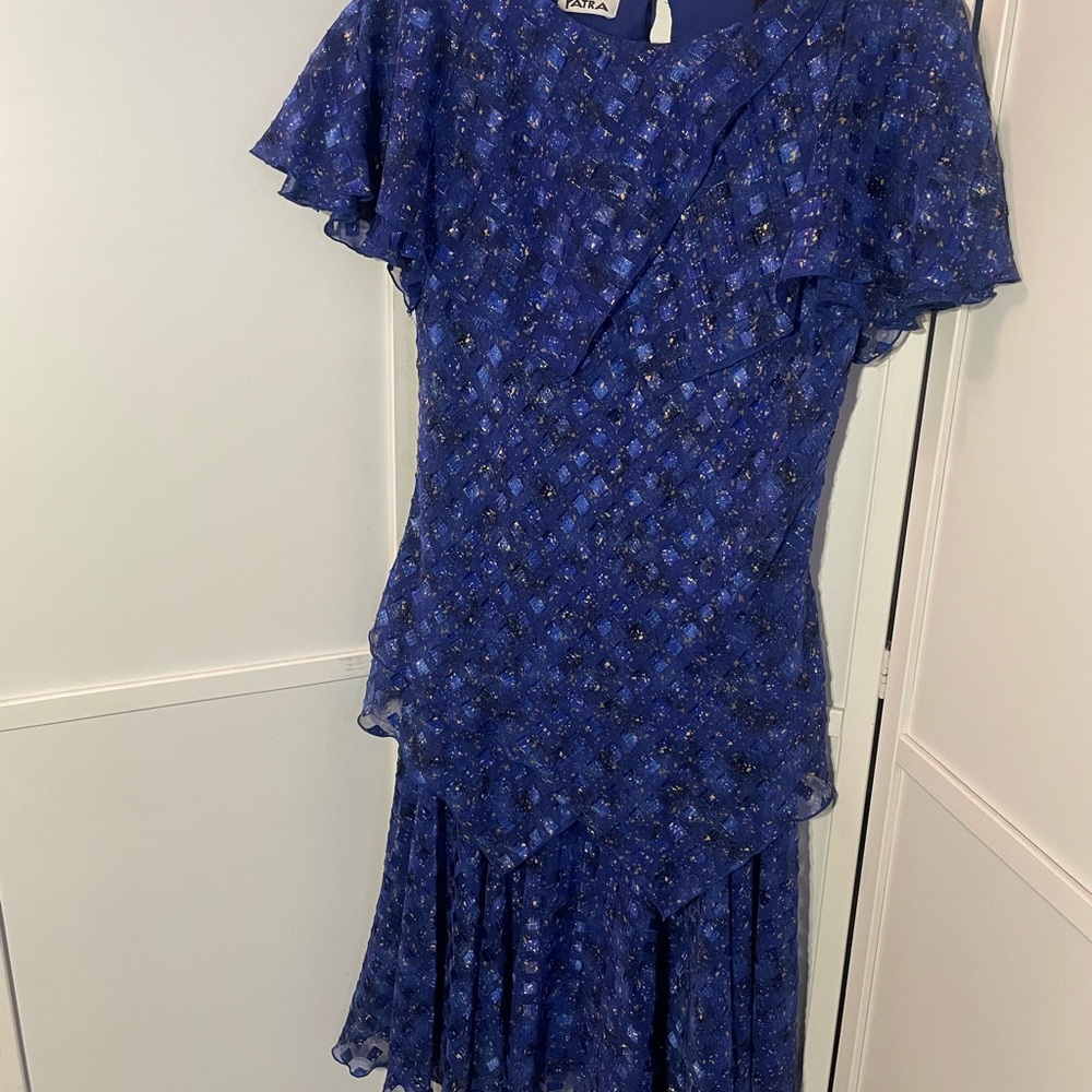 Tiered Wrap Style Dress. Stunning lace layers.